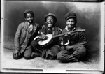 Three children with banjo