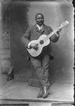 Man with Guitar [member of Polk Miller's Old South Quartette]