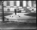 Convict Feeding Squirrels in Capitol Square, 1890