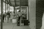 Shoppers outside Grants/Safeway, Farmville, Va., August 1963