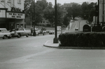 Men standing in parking lot near State Theater, Farmville, Va., August 1963, #002