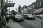 View of Main Street and protesters at Southside Sundry, Farmville, Va., July 1963, #003