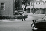 Man walking on Main Street, Farmville, Va., July 1963