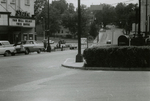 Men standing in parking lot near State Theater, Farmville, Va., August 1963, #003