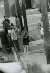 People standing near car, Farmville, Va., August 1963