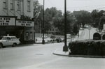 Men standing in parking lot near State Theater, Farmville, Va., August 1963, #001