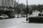 Men standing in parking lot near State Theater, Farmville, Va., August 1963, #004