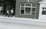 Men walking on Main Street, Farmville, Va., July 1963, #001