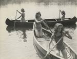 Girl Scouts Canoeing at Camp