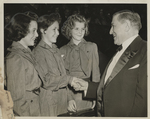 Girl Scouts Elizabeth Quirk, Sally Scheiry, and Josephine Morthorst with Supreme Court Justice Owen J. Roberts, 1942-04-10