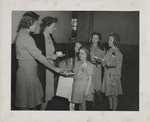 Girl Scouts Having Tea Service