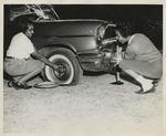 Girl Scouts Change a Flat Tire