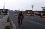 Bike rider at Willow Lawn by Richmond (Va.). Division of Comprehensive Planning